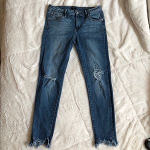 Distressed ankle jeans